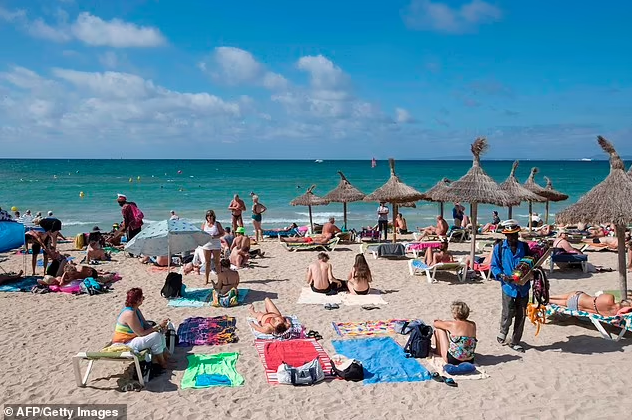 Tourists are fighting for the best spots at the beach with parasols